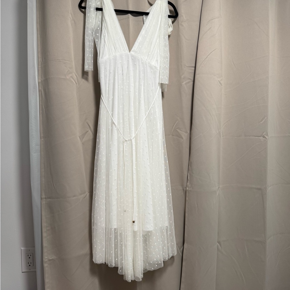 White Midi flowy dress with Plunge Neckline.
